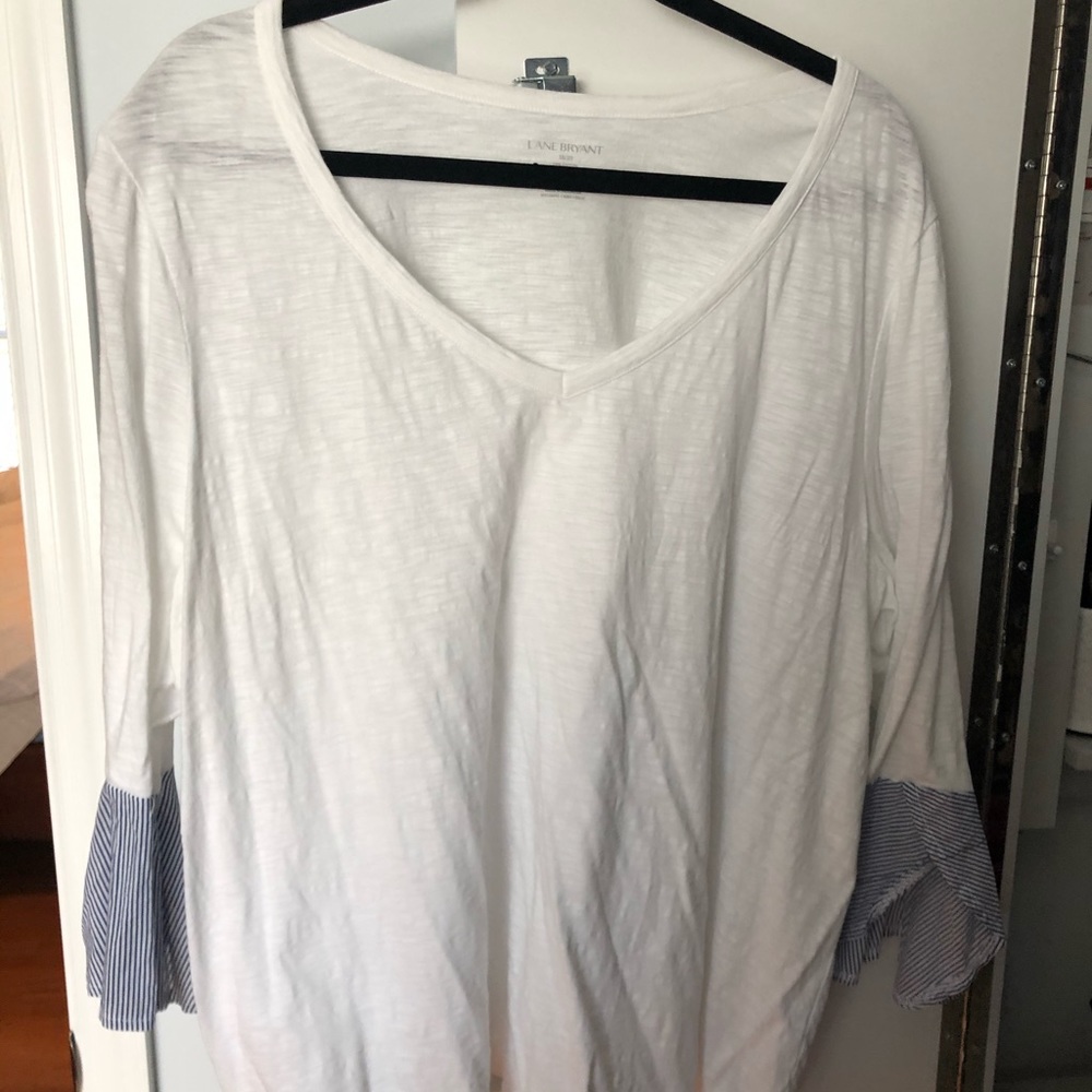 White shirt with blue striped ruffle sleeves